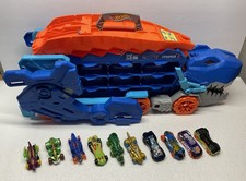 Hot Wheels City Toy Track Set, Ultimate T-Rex Transporter Hauler e 10 carros comprar usado  Enviando para Brazil