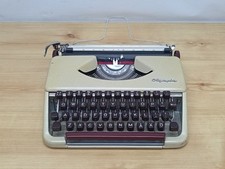 Espléndida máquina de escribir con teclado alemana Olympia de colección de los años 70 - hallazgo de liquidación  segunda mano  Embacar hacia Mexico