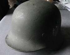 Casque allemand insigne d'occasion Casque allemand insigne d'occasion  Villé