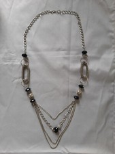 Collier long argenté d'occasion  Sauveterre-de-Guyenne