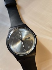 Relógio Swatch mostrador prata com pulseira preta.  Dia/data ótimo estado sem caixa. comprar usado  Enviando para Brazil