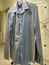 Camicia grigia attillata usato  Guastalla
