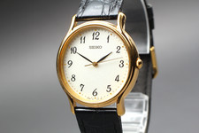 Relógio masculino vintage 1996 [quase perfeito] SEIKO 7N01-0BR0 32mm mostrador dourado quartzo redondo comprar usado  Enviando para Brazil