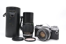 Câmera de Filme 35mm SLR Olympus OM-2N G.Zuiko com 2 Lentes do JAPÃO funcionando testada comprar usado Câmera de Filme 35mm SLR Olympus OM-2N G.Zuiko com 2 Lentes do JAPÃO funcionando testada comprar usado  Enviando para Brazil