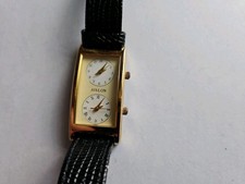 Usado, Raro relógio tanque analógico duplo fuso horário duplo movimento quartzo pulseira de couro dourado comprar usado Usado, Raro relógio tanque analógico duplo fuso horário duplo movimento quartzo pulseira de couro dourado comprar usado  Enviando para Brazil