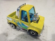 Caminhão de corrida Hot Wheels '83 Toon'd Chevy Silverado amarelo HW brinquedo tooned 2025 comprar usado  Enviando para Brazil