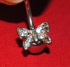Piercing nombril acier d'occasion  Maclas