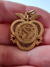 Medaille pendentif publicitair d'occasion  Soissons