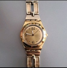 Relógio de quartzo Swatch Irony tom dourado aço inoxidável, resistente à água, fabricado na Suíça comprar usado  Enviando para Brazil