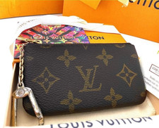 Louis vuitton pochette d'occasion  Expédié en Belgium