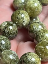 Bracelet grenat vert d'occasion  Saint-Pardoux