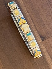 Menina loira com saia azul e top branco infantil tamanho pulseira berloque italiana nova comprar usado  Enviando para Brazil