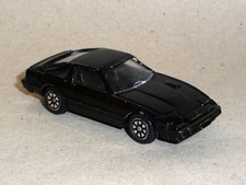 Modellauto yatming datsun gebraucht kaufen  Allenfeld, Boos, Hargesheim