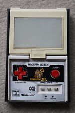 JOGO E RELÓGIO NINTENDO CGL PANORAMA BURRO KONG JR CJ-93 1983 ESTADO DE FUNCIONAMENTO comprar usado  Enviando para Brazil