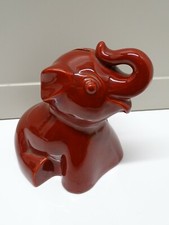 Tirelire elephant rouge d'occasion  Soyaux