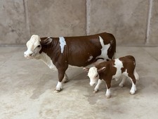 Figuras de fazenda Schleich SIMMENTAL COW & Bull CALF Dairy 2008 marrom e branco, usado comprar usado  Enviando para Brazil