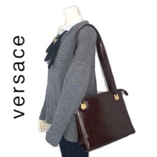 Versace croco embossed d'occasion  Expédié en Belgium