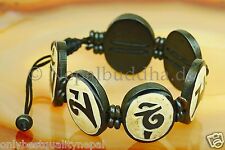 Bracelet noir blanc d'occasion  Expédié en France