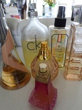 Divertida colección de 7 PERFUMES - Calvin Klein; Jimmy Choo etc - como se describe segunda mano  Embacar hacia Mexico
