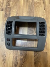Usado, 2005-2012 Nissan Xterra painel central moldura acabamento rádio com aberturas cinza fabricante de equipamento original comprar usado  Enviando para Brazil