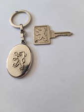 Porte clés clé d'occasion  La Roche-sur-Yon