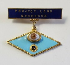 Broche Vintage Lions Club International Projeto Look Ensenada um olho (J660) comprar usado  Enviando para Brazil