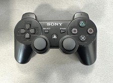 Manette dualshock noire d'occasion  Les Mureaux