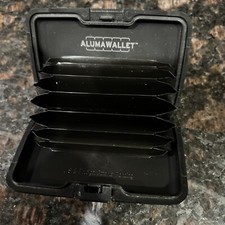 Aluma black wallet for sale  Converse