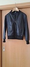 Kunstlederjacke 146 152 gebraucht kaufen  Marktsteft, Obernbreit, Seinsheim