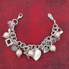 Bracelet breloques signé d'occasion  Saint-Jean-de-Boiseau