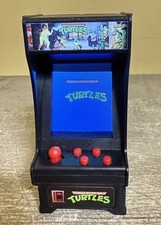 Chaveiro mini vídeo funciona Teenage Mutant Ninja Turtles TMNT minúsculo armário arcade comprar usado  Enviando para Brazil