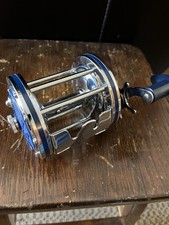 Molinete de pesca vintage Hurricane 614 golfinho olímpico água salgada novo na caixa comprar usado  Enviando para Brazil