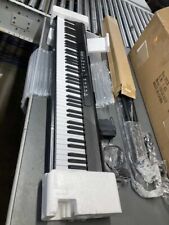 Piano digital portátil de 61 teclas con altavoces, micrófono y soporte para sábanas segunda mano  Embacar hacia Mexico