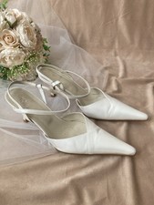 Chaussures blanc nacré d'occasion  Bléré