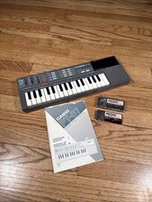 Mini teclado Casio PT-87 antigo e 2 pacotes de ROM RO-551 e RO-275 - Funcionando! comprar usado  Enviando para Brazil