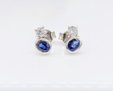 Boucles oreilles blanc d'occasion  Les Mureaux