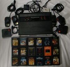 Console de jogos Atari 2600 com 18 carrinhos de jogos, joysticks e remos. comprar usado  Enviando para Brazil