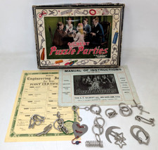 Quebra-cabeça antigo 1920s A C Gilbert festas anéis de metal quebra-cabeça #1031 jogo comprar usado  Enviando para Brazil