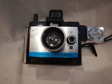 Usado, Câmera Polaroid Land The Clincher e 6 caixas de 3 cubos de flash total de 72 flashes comprar usado Usado, Câmera Polaroid Land The Clincher e 6 caixas de 3 cubos de flash total de 72 flashes comprar usado  Enviando para Brazil