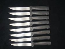 Black handle serrated for sale  Plano