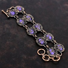 Oval copper charoite d'occasion  Expédié en Belgium