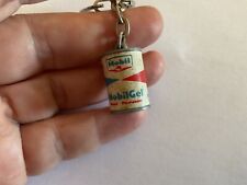 Mobilgel can keychain d'occasion  Expédié en Belgium