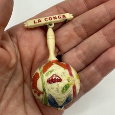 Conga maraca brooch d'occasion  Expédié en Belgium