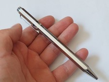 Bolígrafo vintage de metal de cuatro colores de los años 80 segunda mano  Embacar hacia Mexico