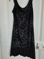 Elegante robe courte d'occasion  France