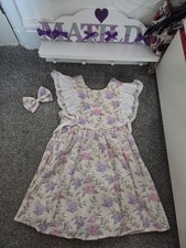 Dolly wears floral for sale  WARRINGTON