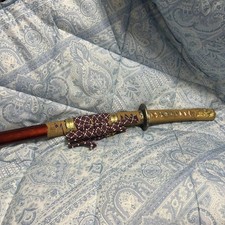 Espada vermelha decorada a ouro com cordão roxo comprar usado Espada vermelha decorada a ouro com cordão roxo comprar usado  Enviando para Brazil