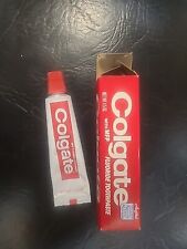 Pasta de dientes Colgate tubo de metal abierto vintage 1982 con caja MFP fluoruro algunos usados segunda mano  Embacar hacia Argentina