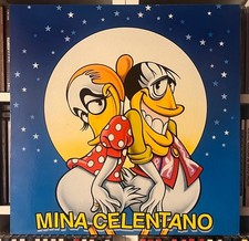 Mina celentano prima usato  Due Carrare