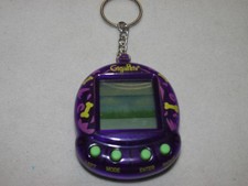 Chaveiro digital Giga Pets Pixel Puppy * roxo * 2018 animal de estimação comprar usado Chaveiro digital Giga Pets Pixel Puppy * roxo * 2018 animal de estimação comprar usado  Enviando para Brazil
